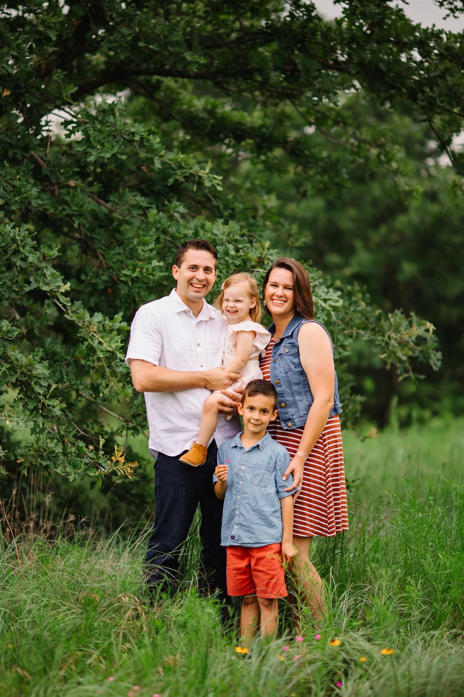 a family standing outside a family standing outside